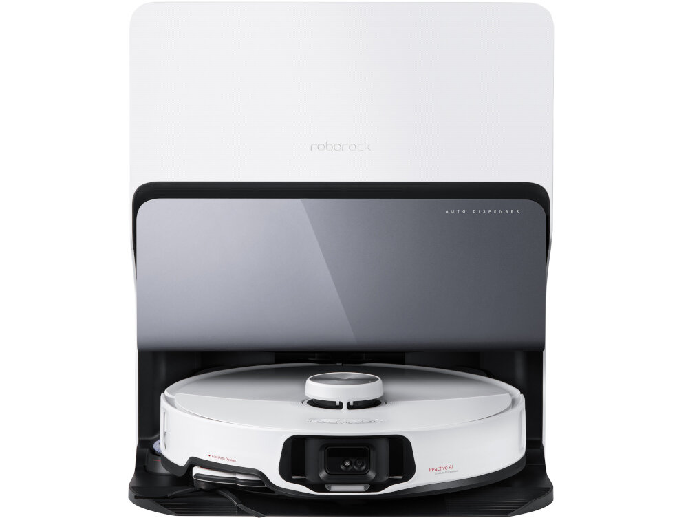 Na zdjęciu znajduje się biały robot sprzątający umieszczony w stacji dokującej. Widoczne są napisy \'roborock\' i \'AUTO DISPENSER\'.