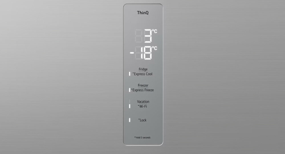 Panel sterowania lodówki z wyświetlaczem pokazującym temperatury: 3°C i -18°C. Widoczne są opcje: Fridge \'Express Cool\', Freezer \'Express Freeze\', Vacation \'Wi-Fi\', \'Lock\' oraz napis \'Hold 3 seconds\'.