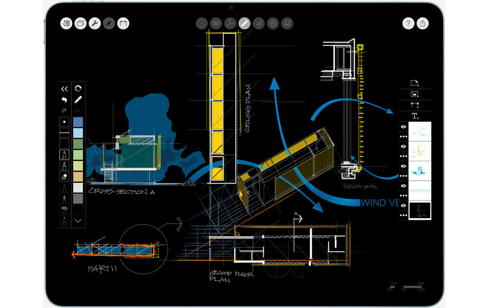 Na ekranie tabletu widoczny jest projekt architektoniczny z różnymi schematami i rysunkami technicznymi. W tle dominuje czarne tło z kolorowymi liniami i oznaczeniami.