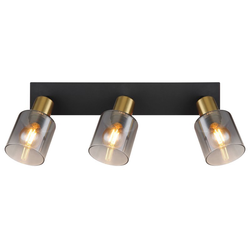 Lampa sufitowa z trzema reflektorami, każdy z przydymionym szklanym kloszem i złotymi elementami, zamontowana na czarnej matowej podstawie. Żarówki są widoczne wewnątrz kloszy.
