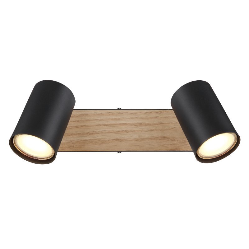 Lampa sufitowa z dwoma czarnymi matowymi reflektorami zamontowanymi na prostokątnej podstawie z MDF imitującej drewno. Reflektory są skierowane w przeciwnych kierunkach i emitują ciepłe światło.