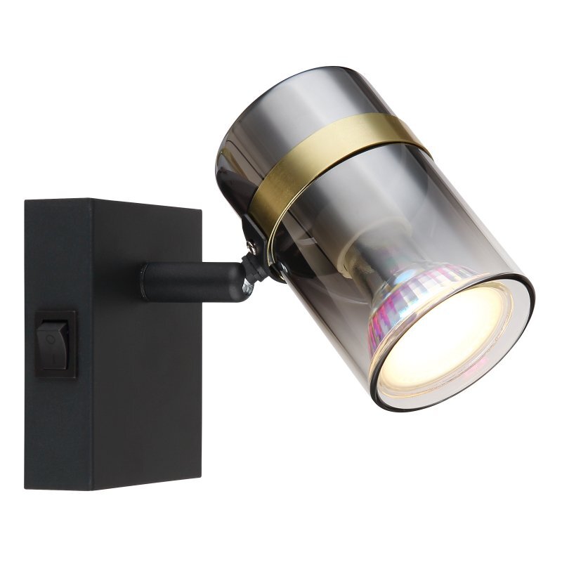 Lampa reflektorowa z czarną matową podstawą i przydymionym szklanym kloszem, wyposażona w włącznik. Klosz jest zamocowany na ruchomym ramieniu, a wewnątrz znajduje się oprawka GU10.