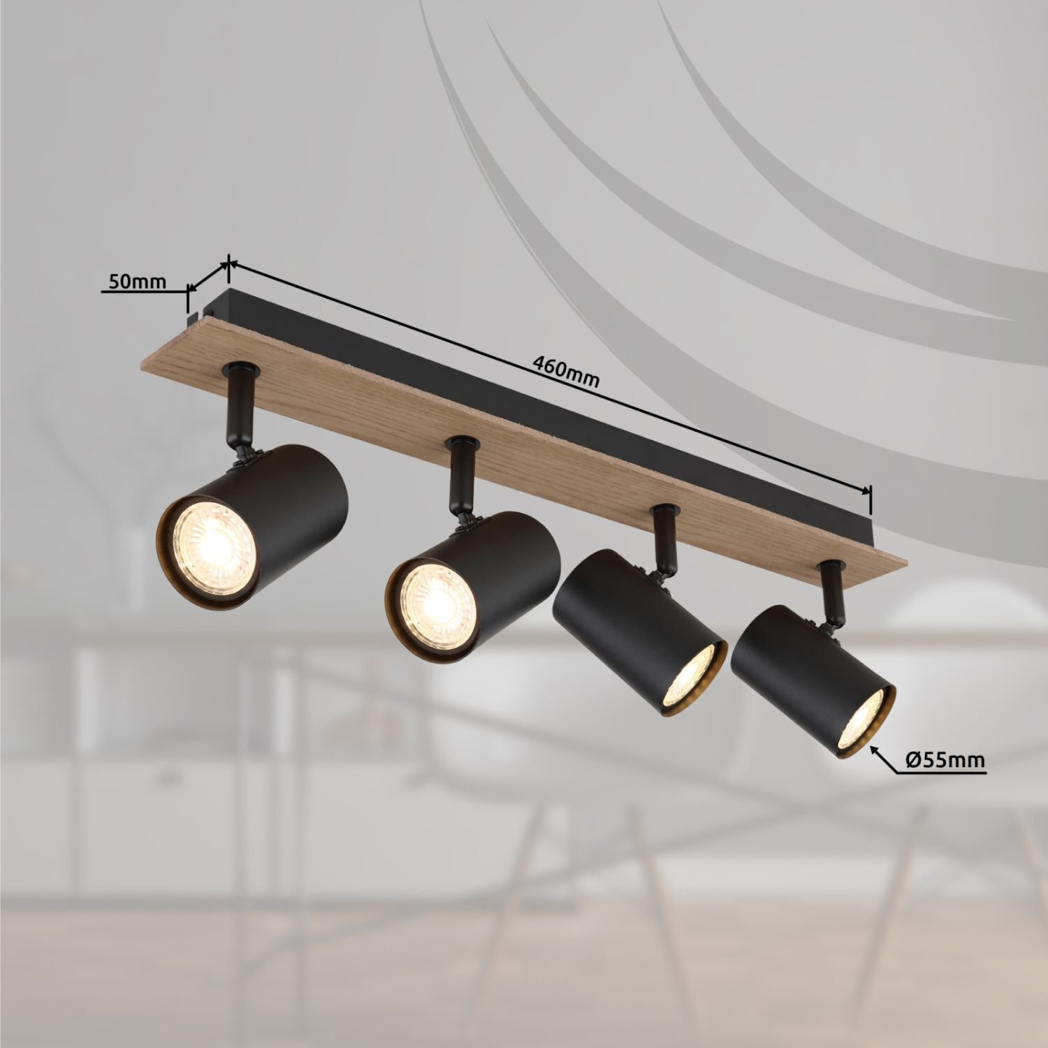 Lampa sufitowa z czterema czarnymi reflektorami zamontowana na drewnianej listwie. Wymiary listwy to 460mm długości i 50mm szerokości, a średnica reflektorów wynosi 55mm.