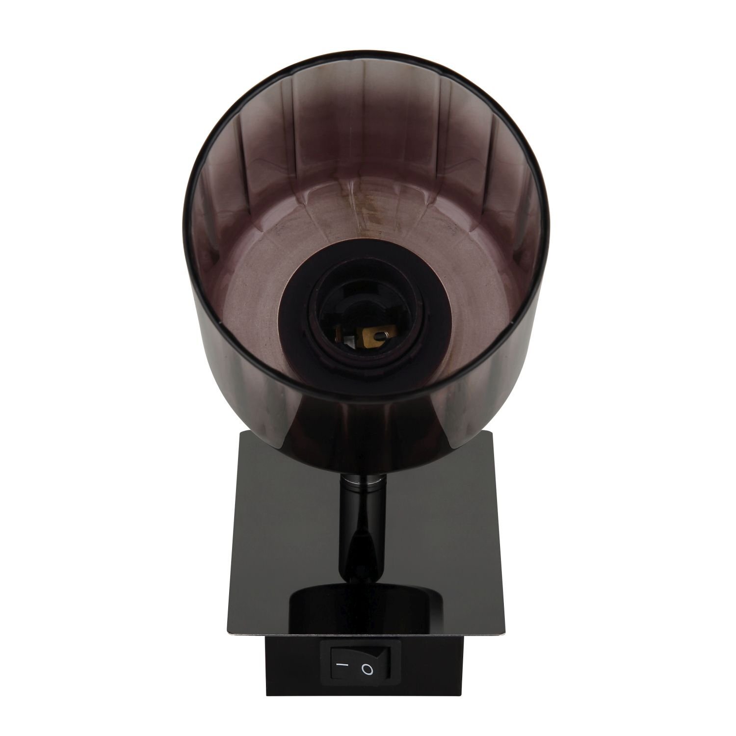 Lampa reflektor z ciemnym, przezroczystym kloszem zamontowana na prostokątnej podstawie z włącznikiem. Wewnątrz klosza widoczna jest oprawka na żarówkę.