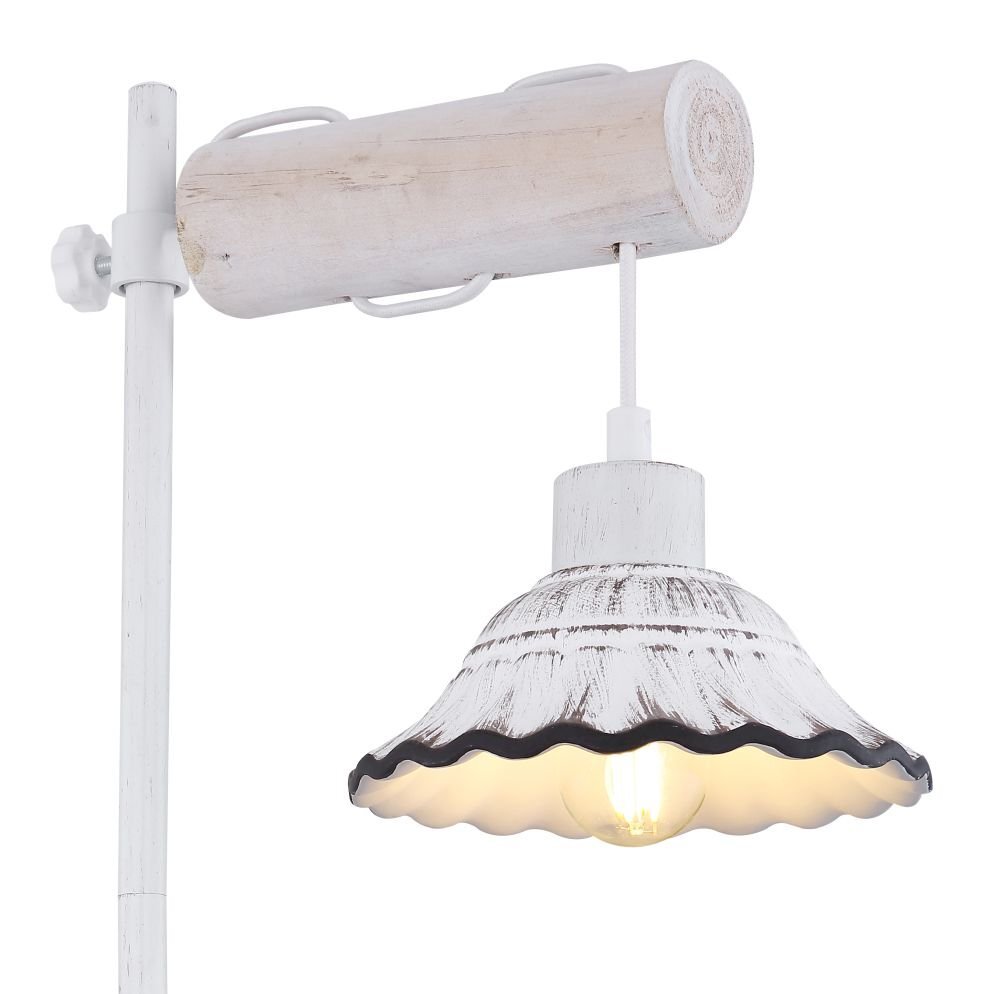 Biała lampa stołowa z drewnianym i ceramicznym wykończeniem, posiada falisty klosz i widoczną żarówkę. Lampa jest zamontowana na pionowym wsporniku z wyłącznikiem.