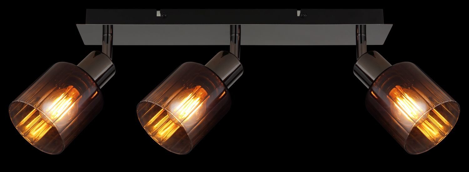 Na obrazie widoczna jest lampa reflektorowa z trzema punktami świetlnymi, każdy z przezroczystym kloszem i widoczną żarówką wewnątrz. Klosze mają ciepłe, bursztynowe zabarwienie, a całość zamocowana jest na prostokątnej, ciemnej podstawie.