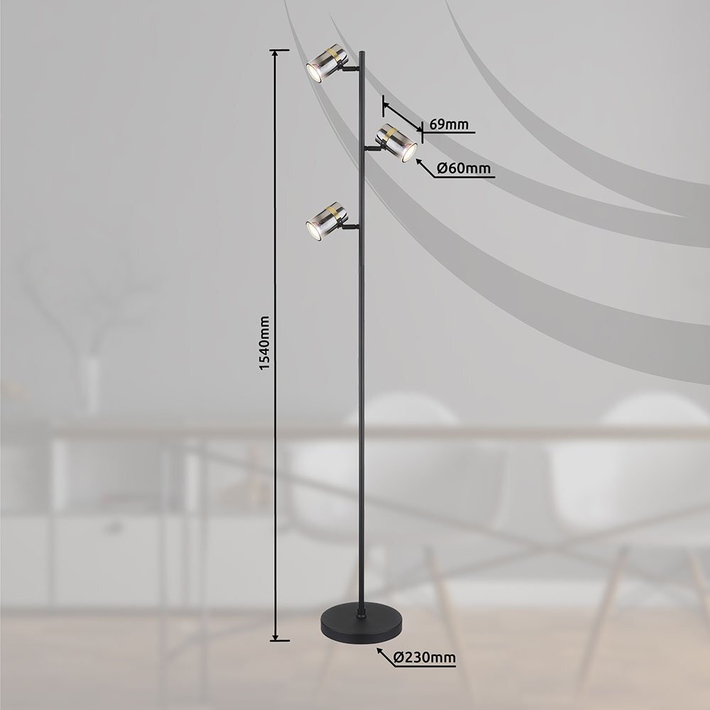 Czarna matowa lampa podłogowa z trzema reflektorami, każdy o średnicy 60 mm i długości 69 mm, z mosiężnymi detalami. Wysokość lampy wynosi 1540 mm, a średnica podstawy to 230 mm.