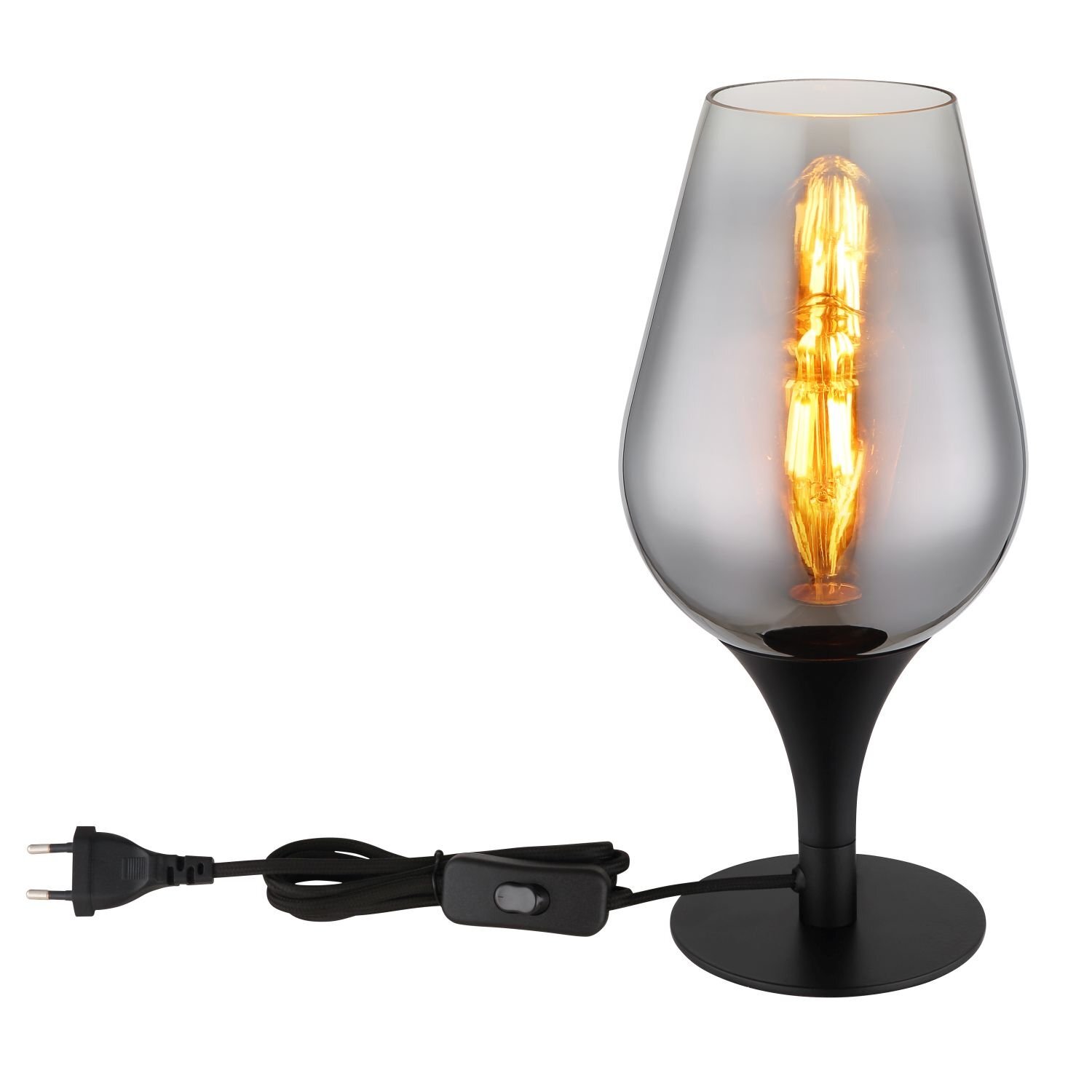 Lampa stołowa o kształcie kielicha z przezroczystym kloszem, wewnątrz którego znajduje się żarówka emitująca ciepłe światło. Lampa posiada czarną podstawę i przewód z włącznikiem.