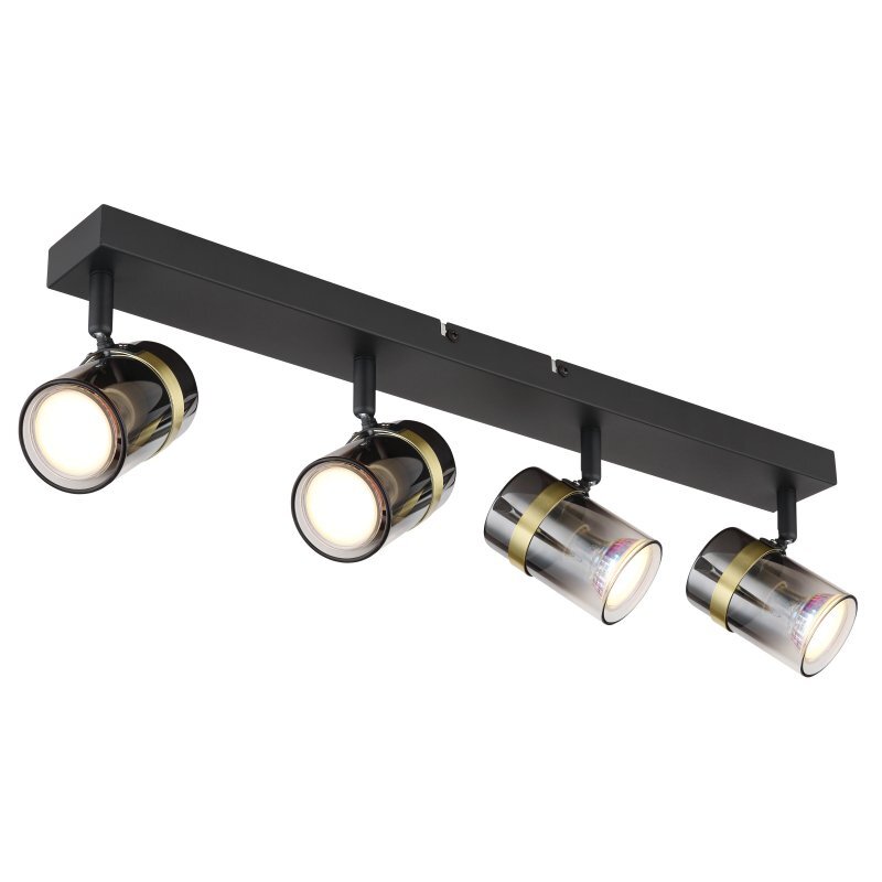 Lampa sufitowa z czterema reflektorami w czarnym matowym wykończeniu z przydymionym szkłem i mosiężnymi akcentami. Reflektory są zamontowane na prostokątnej listwie.