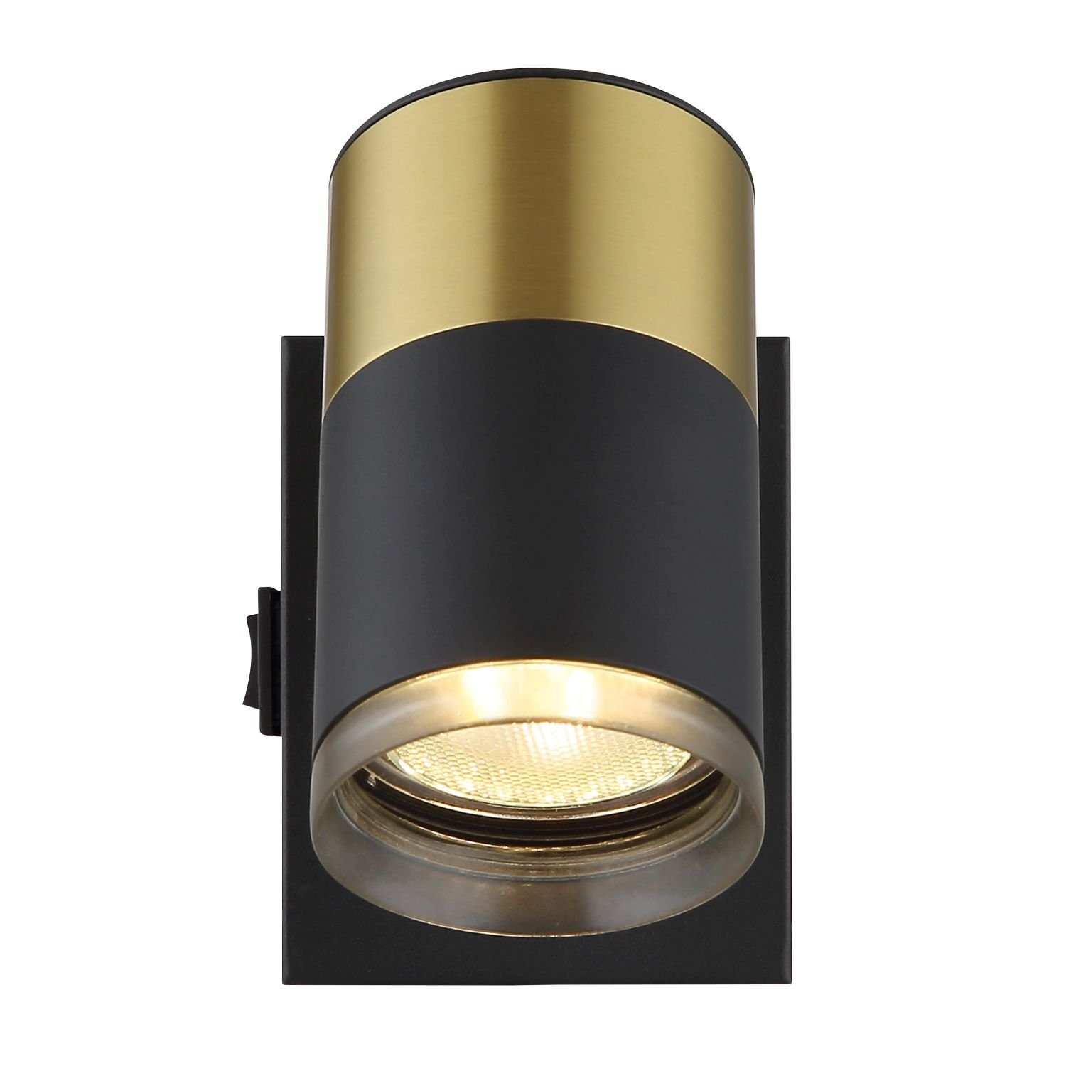 Cylindryczna lampa sufitowa w kolorze czarnym i złotym, z widocznym źródłem światła na dole. Lampa zamontowana jest na prostokątnej podstawie.