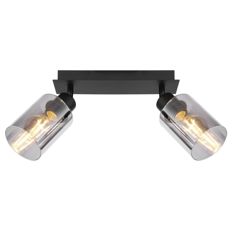 Czarna lampa sufitowa z dwoma reflektorami, każdy z przydymionym szklanym kloszem i widoczną żarówką wewnątrz. Reflektory są zamontowane na prostokątnej, metalowej podstawie.