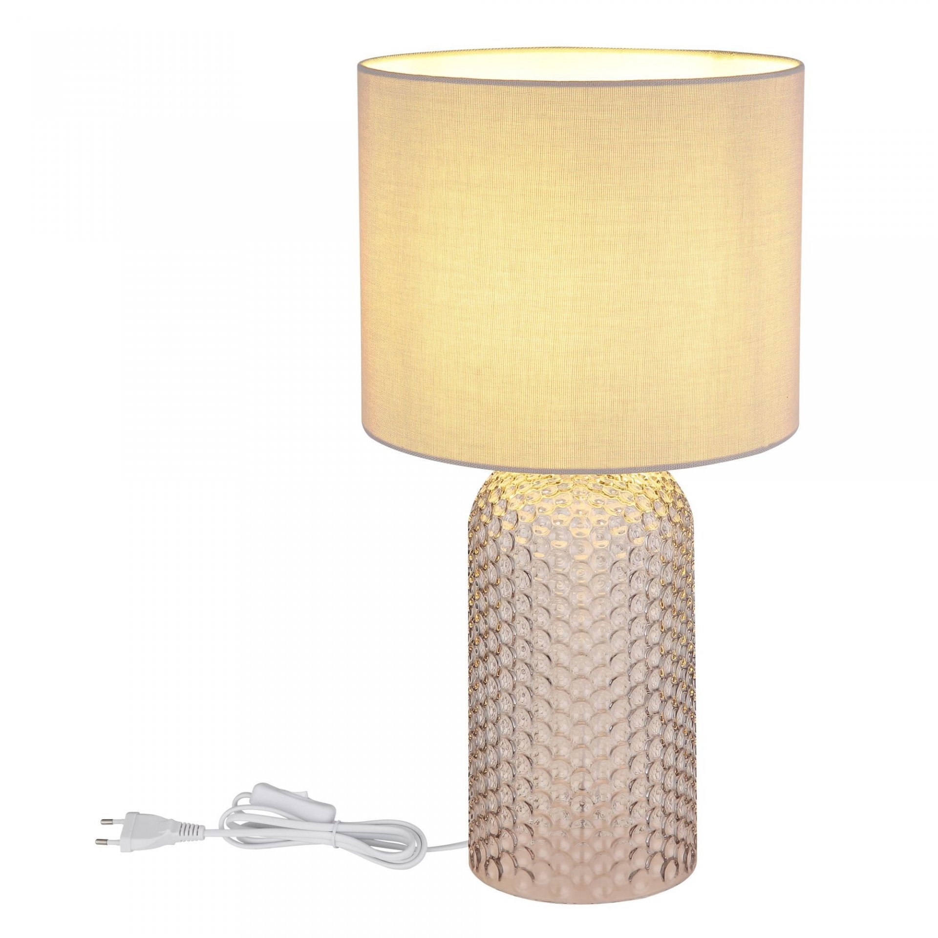 Lampa stołowa z cylindrycznym, teksturowanym szklanym korpusem i jasnym, materiałowym abażurem. Do lampy dołączony jest biały przewód z wtyczką.