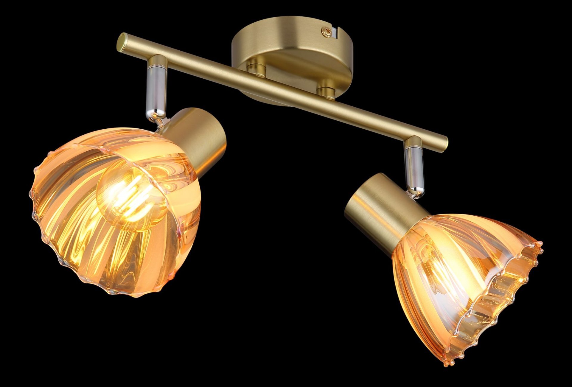 Na obrazie widoczny jest reflektor sufitowy z dwoma punktami świetlnymi, wykonany z metalu w złotym kolorze i szklanymi kloszami o falistym wzorze. Lampa jest nowoczesna i przeznaczona do wnętrz.