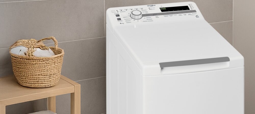 PRALKA WHIRLPOOL MTDLR 6040S PL/N Kadr ukazuje wnętrze pralki ładowanej od góry, otwartej od góry. Widać konstrukcję bębna przygotowanego do załadunku energooszczędność skuteczne pranie 6,5 kg 12 programów