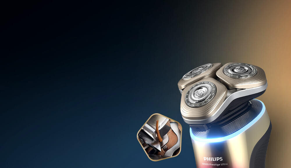 Obraz przedstawia golarkę z trzema okrągłymi głowicami tnącymi oraz logo PHILIPS na obudowie. W tle widoczny jest ciemny gradient, a obok golarki znajduje się mała ikona zbliżenia ostrzy.
