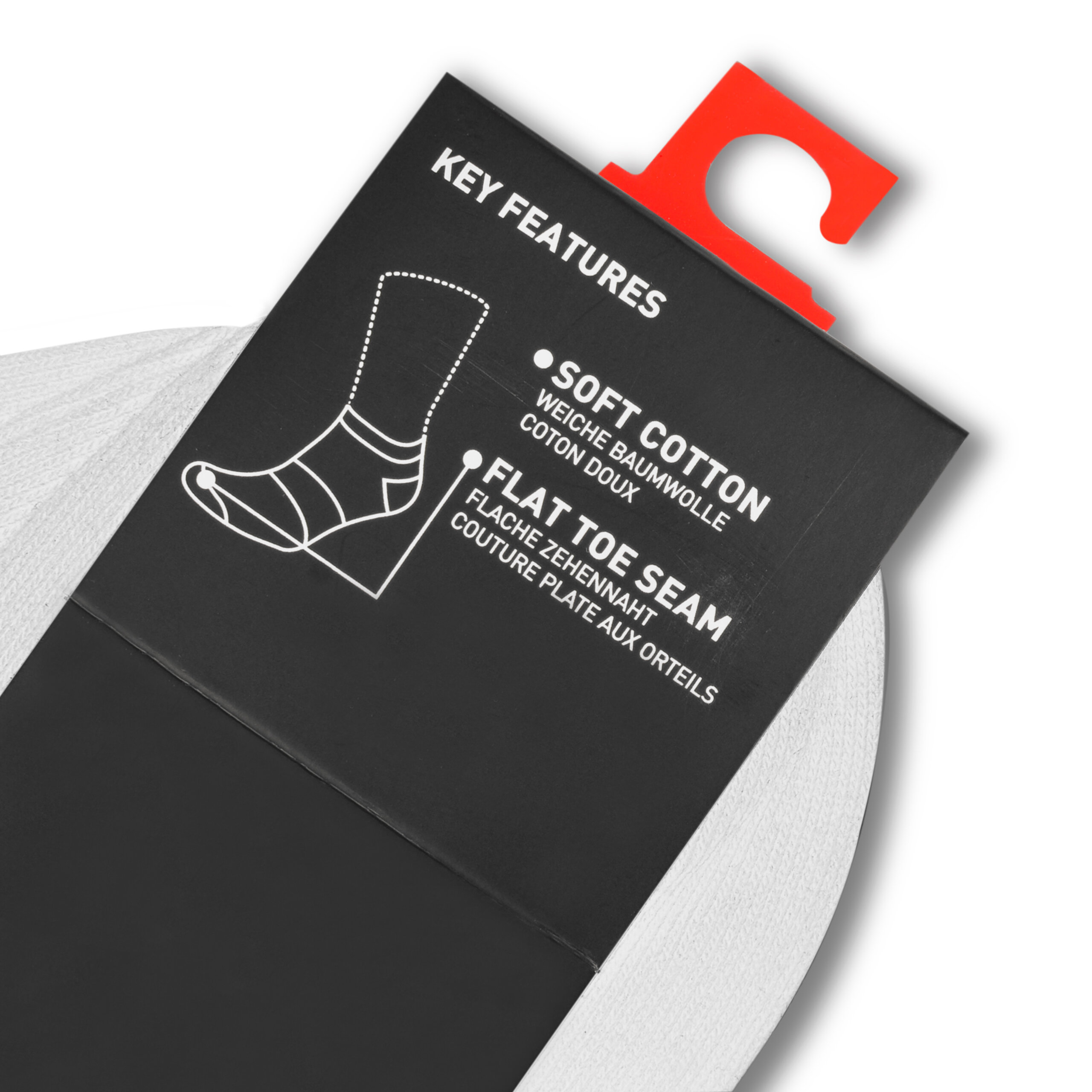 Opakowanie skarpet z napisem \'KEY FEATURES\' oraz grafiką przedstawiającą skarpetę. Widoczne cechy to \'SOFT COTTON\' i \'FLAT TOE SEAM\' z tłumaczeniami w kilku językach.