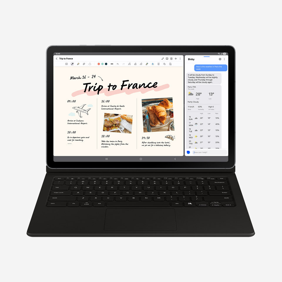 Tablet z klawiaturą wyświetla notatkę zatytułowaną \'Trip to France\' z datami i zdjęciami. Po prawej stronie ekranu widoczna jest aplikacja pogodowa z prognozą dla Paryża.