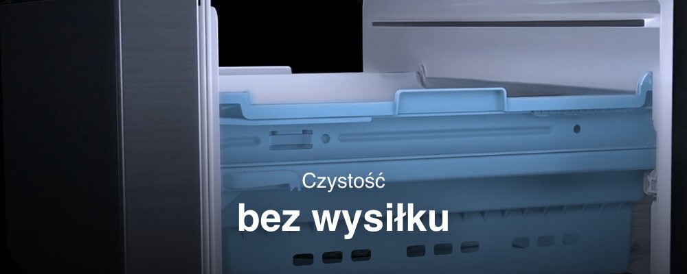 Wnętrze lodówki z widoczną niebieską szufladą. Na obrazie znajduje się tekst: \'Czystość bez wysiłku\'.