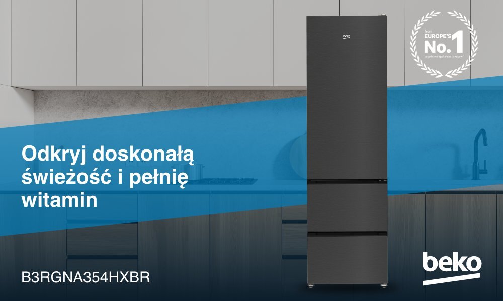 Na obrazie widoczna jest ciemna lodówka z logo beko, umieszczona w nowoczesnej kuchni. Na niebieskim tle znajduje się tekst: \'Odkryj doskonałą świeżość i pełnię witamin\' oraz \'B3RGNA354HXBR\'.