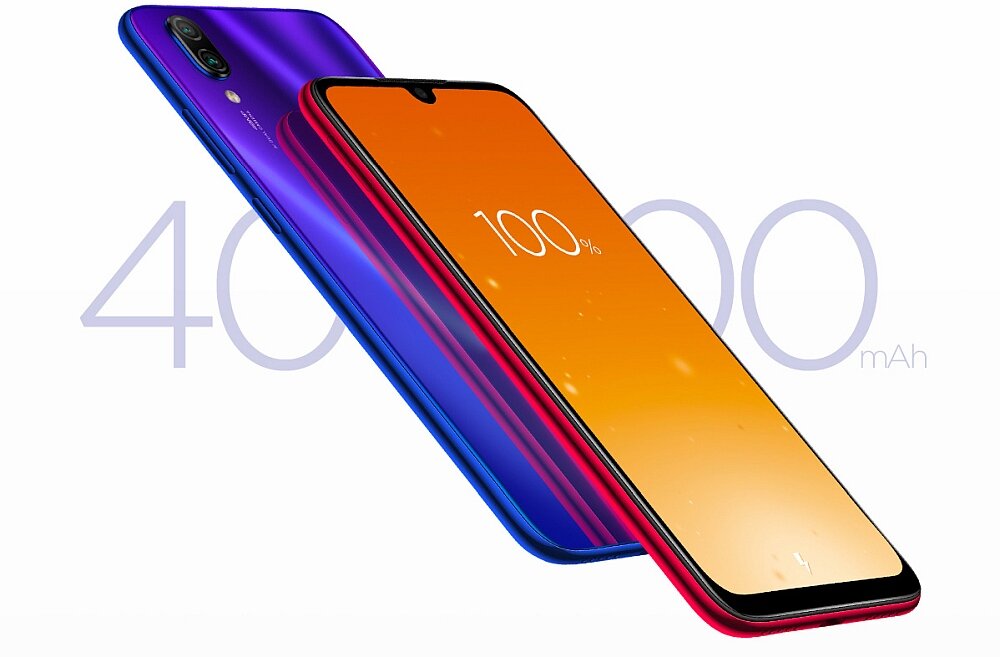 Na obrazie widoczny jest smartfon z gradientową obudową w kolorach fioletowym i czerwonym oraz ekranem wyświetlającym 100%. W tle znajduje się duży napis \'4000 mAh\'.