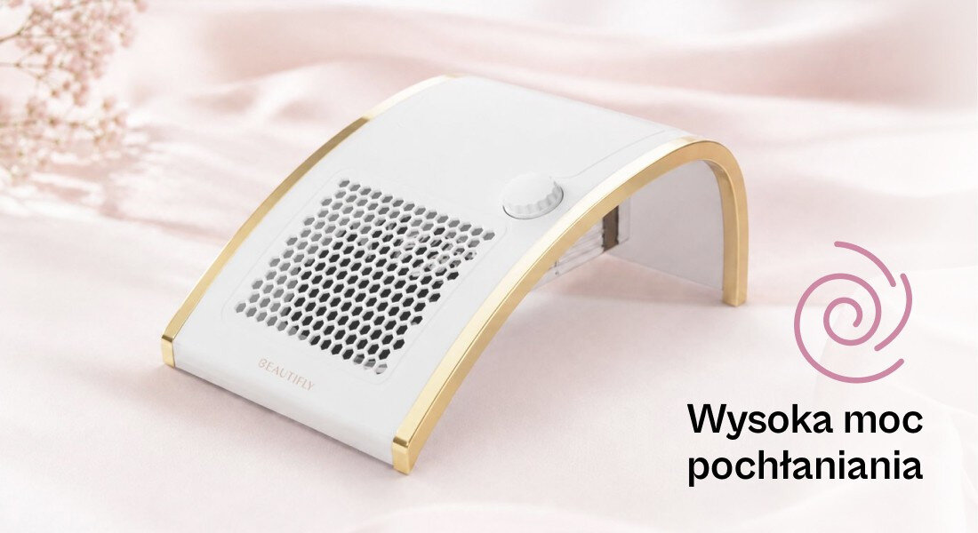Biały pochłaniacz pyłu z złotymi krawędziami i kratką wentylacyjną na różowym tle. Obok widoczny jest napis \'Wysoka moc pochłaniania\'.