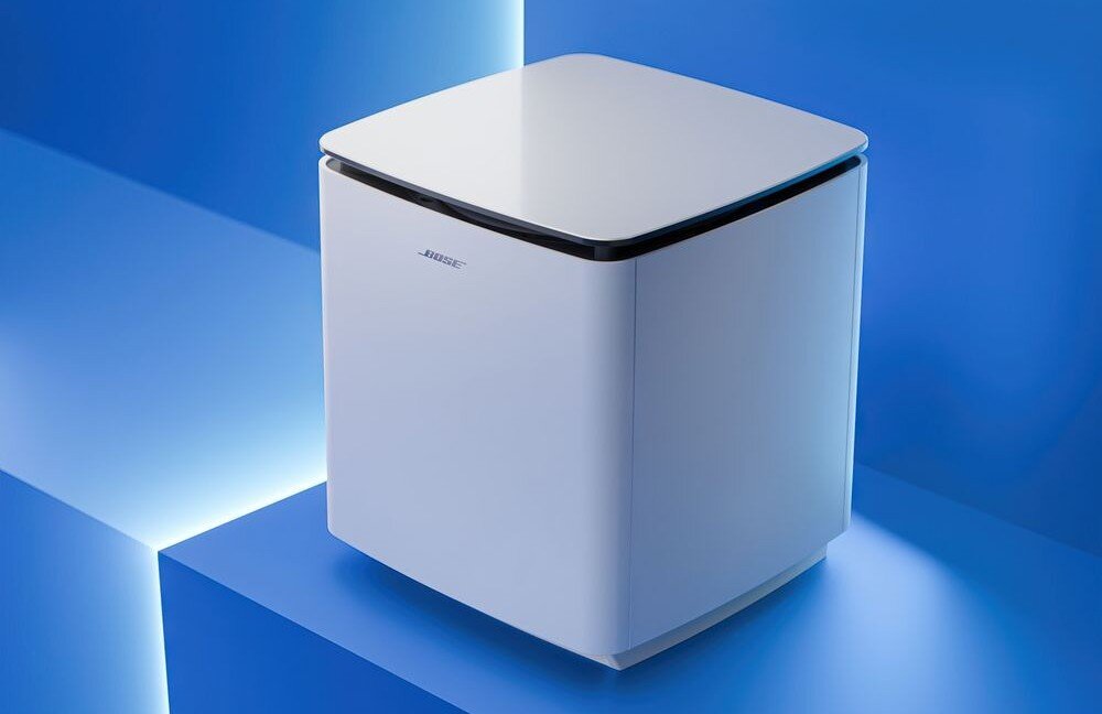 BOSE LIFESTYLE ULTRA Bass Module subwoofer bezprzewodowy kinowy bas głęboki dźwięk elegancki design, urządzenie stojące na niebieskim postumencie