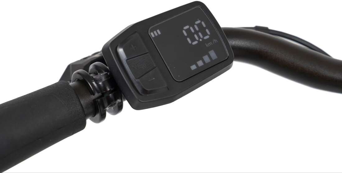 Rower elektryczny ROMET PROECO Easy 28172567-A U17 28 cali Zielony Zbliżenie na wyświetlacz roweru elektrycznego z widocznym odczytem \'0.0 km/h\'. Obok wyświetlacza znajdują się przyciski z oznaczeniami \'+\' i \'-\'.