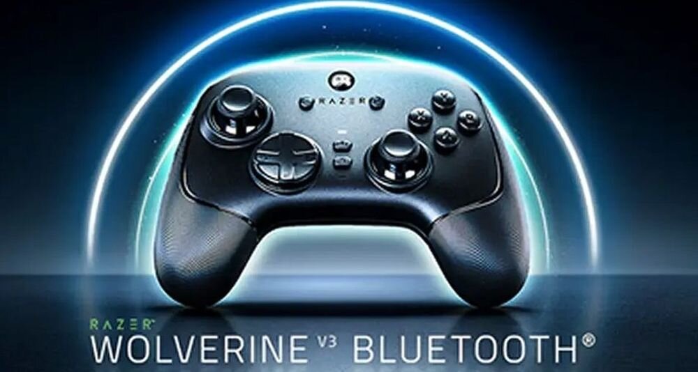 Na obrazie widoczny jest czarny kontroler do gier z logo Razer, otoczony niebieską poświatą. Na dole znajduje się tekst: \'RAZER WOLVERINE V3 BLUETOOTH\'.