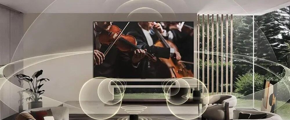 LG 55MRGB86B6A WOW Orchestra soundbar synchronizacja dźwięk przestrzenny, telewizor zawieszony na ścianie w pomieszczeniu