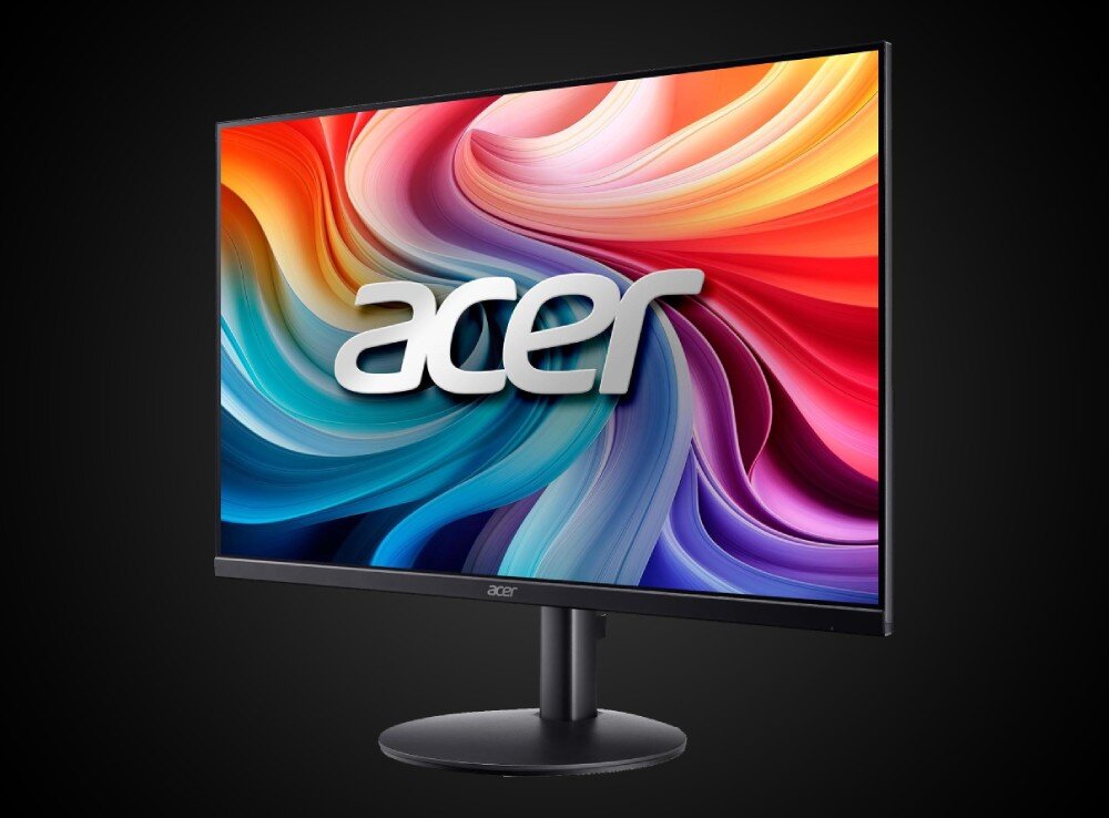 Monitor ACER SA3 SA243Y P1 Monitor komputerowy ukazany pod kątem na ciemnym tle, prezentujący na ekranie trójwymiarowy napis 'acer' na tle falistej grafiki