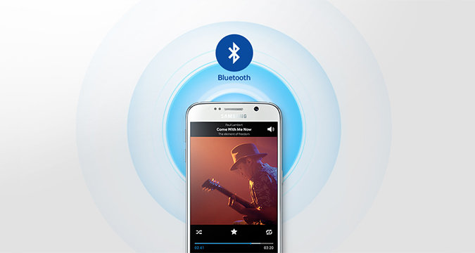 Ilustracja przedstawiająca smartfon Samsung, obok którego zawieszona są ikony aplikacji - Spotify, Deezer i innych.