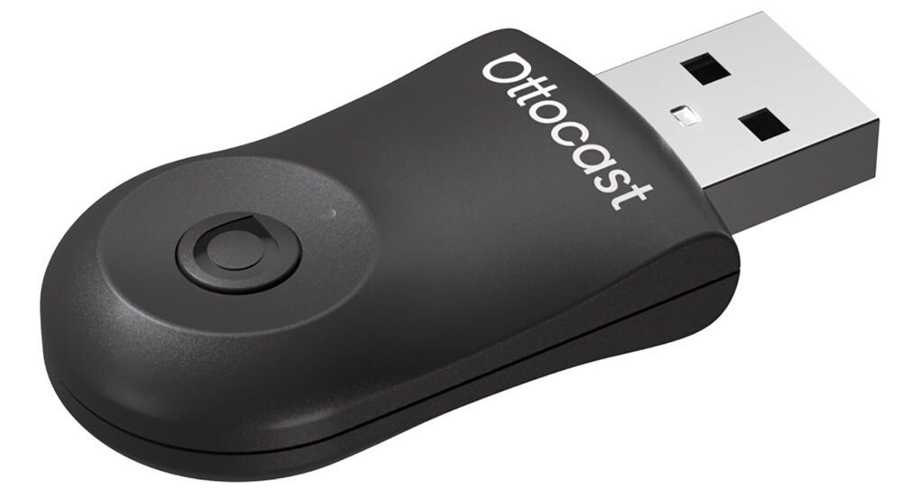 Czarny adapter USB z napisem \'Ottocast\' na górnej powierzchni, posiada okrągły przycisk i prostokątną końcówkę USB.
