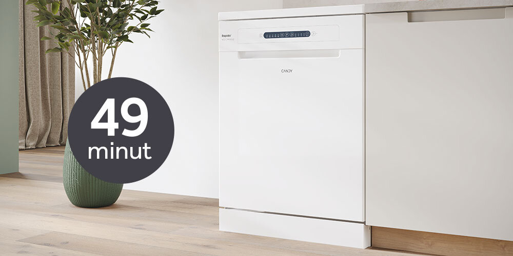 Na obrazie widoczna jest biała zmywarka z logo \'CANDY\' na froncie. Obok zmywarki znajduje się okrągły znak z napisem \'49 minut\'.