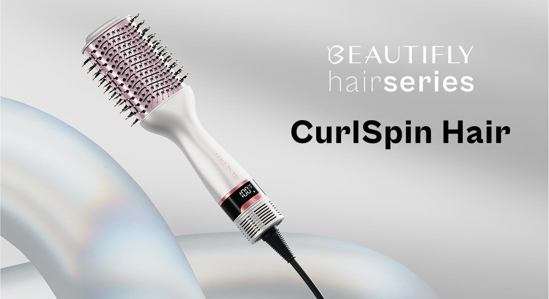 Obraz przedstawia suszarko-lokówkę z różowymi elementami i czarnym wyświetlaczem. Widoczny jest tekst: \'BEAUTIFLY hair series CurlSpin Hair\'.