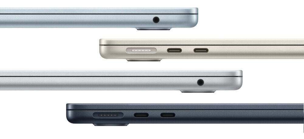 Obraz przedstawia cztery laptopy w różnych kolorach: niebieskim, srebrnym, złotym i ciemnym, widoczne z boku. Każdy laptop ma dwa porty USB-C i gniazdo słuchawkowe.