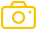 Ikona przedstawia żółty aparat fotograficzny na przezroczystym tle.