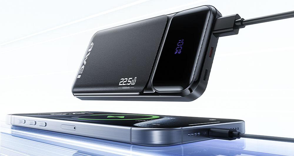 Na obrazie widoczny jest czarny powerbank z wyświetlaczem pokazującym \'100%\', podłączony do smartfona. Na obudowie powerbanka znajduje się napis \'AWEI\' oraz \'22.5W\'.
