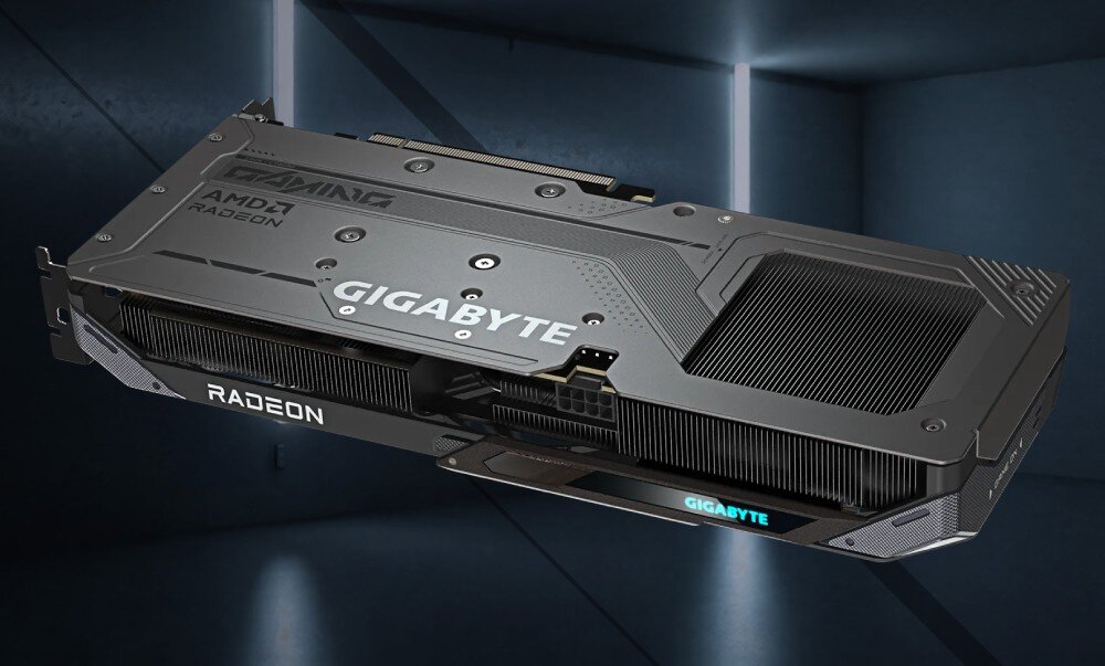Karta graficzna GIGABYTE Radeon RX 9060XT GAMING OC 16G Tył karty graficznej z widoczną metalową płytką zabezpieczającą, z logo 'GIGABYTE' oraz oznaczeniem 'RADEON' wzdłuż krawędzi, komponenty, działanie, stabilność