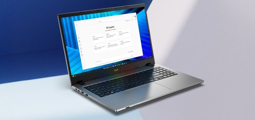 Laptop Acer Aspire z funkcją Copilot wyświetla interfejs AI na ekranie podczas pracy biurowej i organizacji zadań.