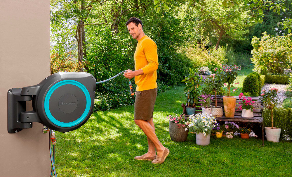 Bęben naścienny GARDENA RollUp M-L 18620-20 latwa obsluga automatyczne zwijanie weza blokada ustawiona na krotkie odstepy wbudowana stalowa sprezyna technologia RollControl