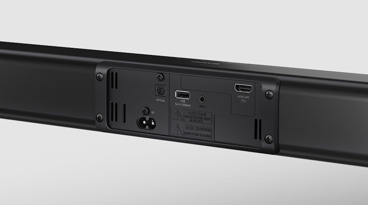 Tył czarnego soundbara z widocznymi portami: optycznym, USB, AUX IN oraz HDMI ARC (TV).