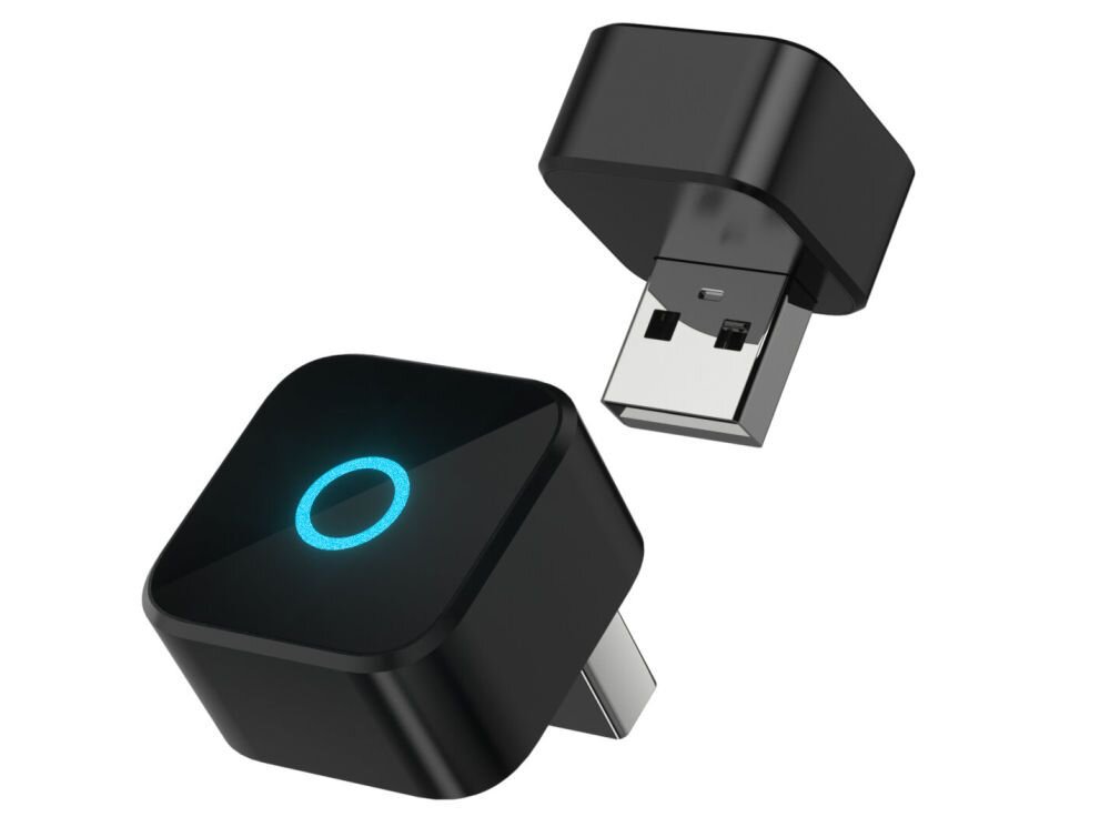 Na obrazie widoczne są dwa czarne adaptery USB z niebieskim podświetleniem w kształcie okręgu na górnej powierzchni. Adaptery mają kompaktowy, kwadratowy kształt z zaokrąglonymi krawędziami.