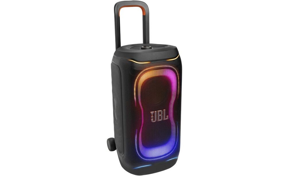 Czarny głośnik JBL z kolorowym podświetleniem i logo \'JBL\' na przodzie, wyposażony w uchwyt i kółka do transportu.