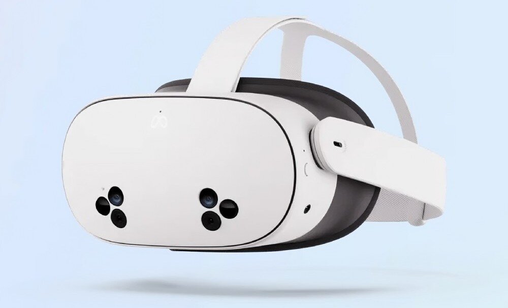 Na obrazie widoczne są białe gogle VR z kilkoma kamerami na przedniej części. Gogle mają elastyczny pasek i logo producenta na górze.