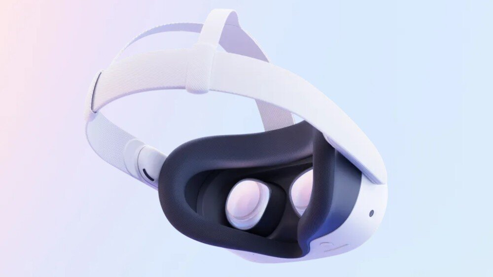 Na obrazie widoczne są białe gogle VR z czarnym wnętrzem i regulowanym paskiem. Gogle mają dwa okrągłe soczewki i minimalistyczny design.