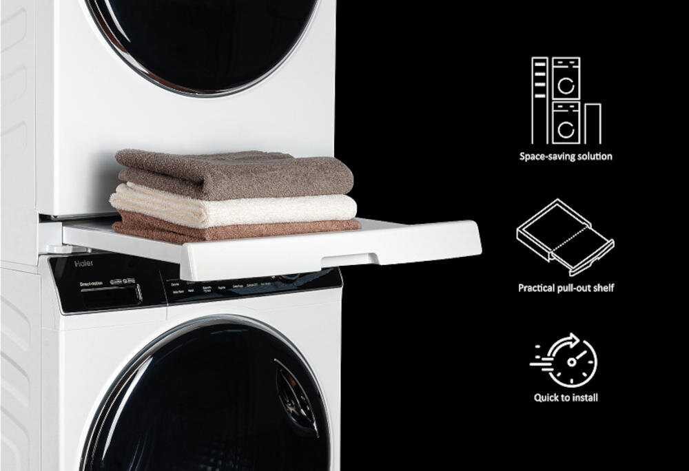Na obrazie widoczna jest pralka i suszarka ustawione jedna na drugiej z wysuniętą półką, na której leżą trzy złożone ręczniki. Obok znajdują się ikony z napisami: \'Space-saving solution\', \'Practical pull-out shelf\', \'Quick to install\'.
