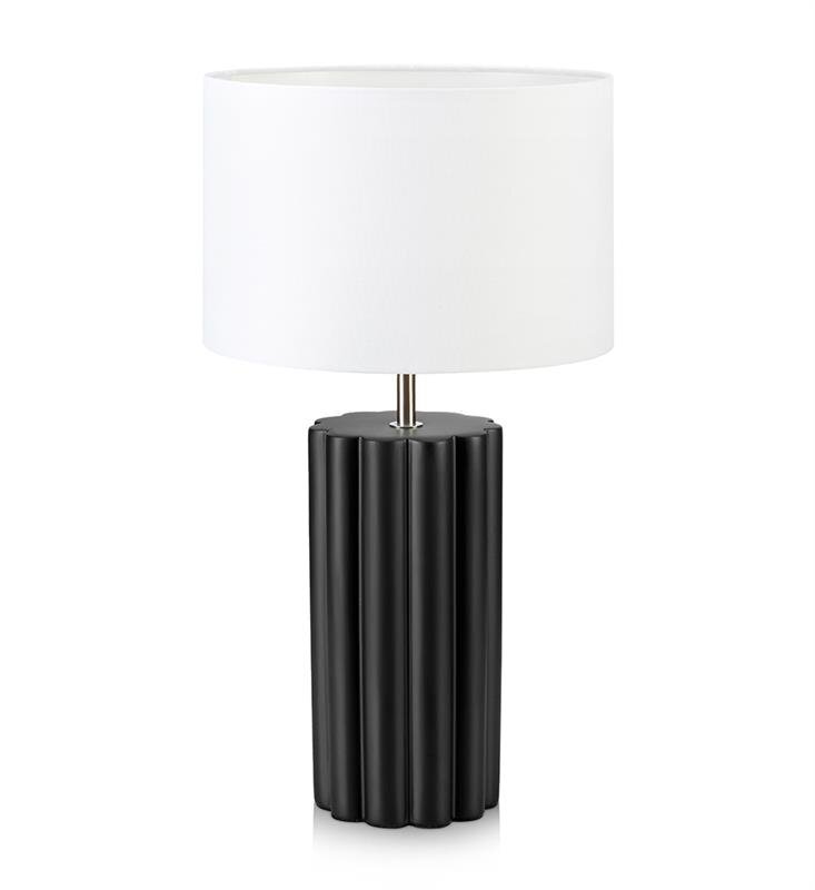 Lampa stołowa z białym, cylindrycznym abażurem i czarną, żebrowaną podstawą.