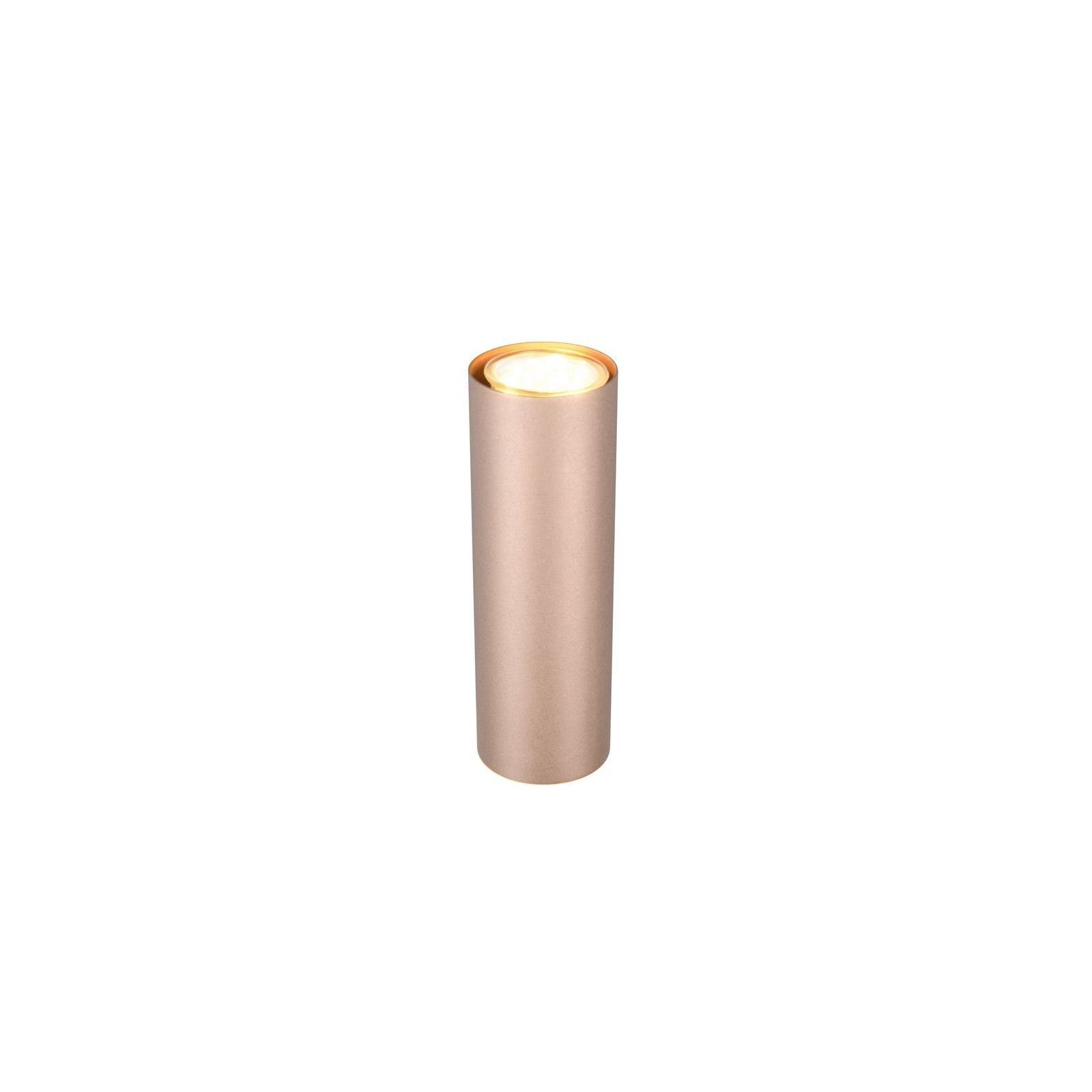 Cylindryczna lampa ścienna w kolorze złotym z widocznym źródłem światła na górze, umieszczona na białym tle.
