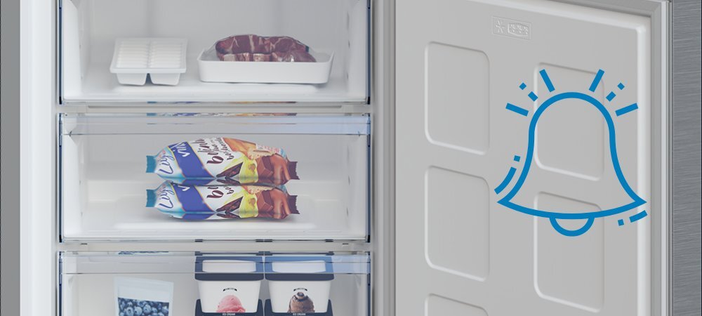 Otwarta lodówka z trzema szufladami, w których znajdują się różne produkty spożywcze. Na drzwiach widoczne jest niebieskie logo w kształcie dzwonka.