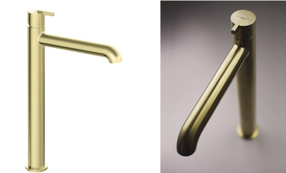 Na obrazie widoczna jest złota bateria umywalkowa o cylindrycznym kształcie z prostym wylewem. Produkt ma minimalistyczny design i jednolitą, metaliczną powierzchnię.